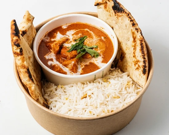 Butter chicken with rice and naan bread at Papa Nash's in Airdrie, AB